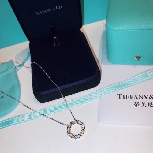 Tiffany & Co.T Diamond Pendant In Rose Gold With A Baguette Tiffany & Co.T Diamond Pendant In Rose Gold With A Baguette